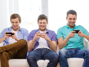 Men Playing Mobile Games Together