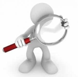 Figure With Magnifying Glass